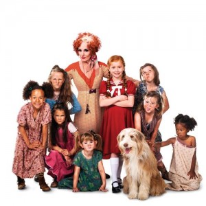 ANNIE - Lesley Joseph as Miss Hannigan with Annie and orphans